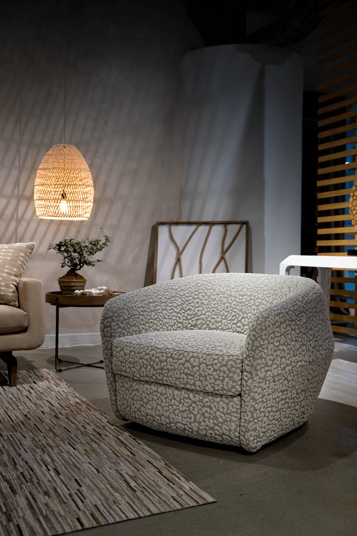 berger4 Berger accent chair in a cream fabric arm chair with curve and swivel product image staged by American Leather