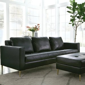 Black three seat couch with ottoman